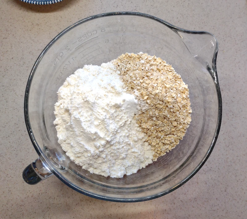 The flour and oats in a second mixing bowl