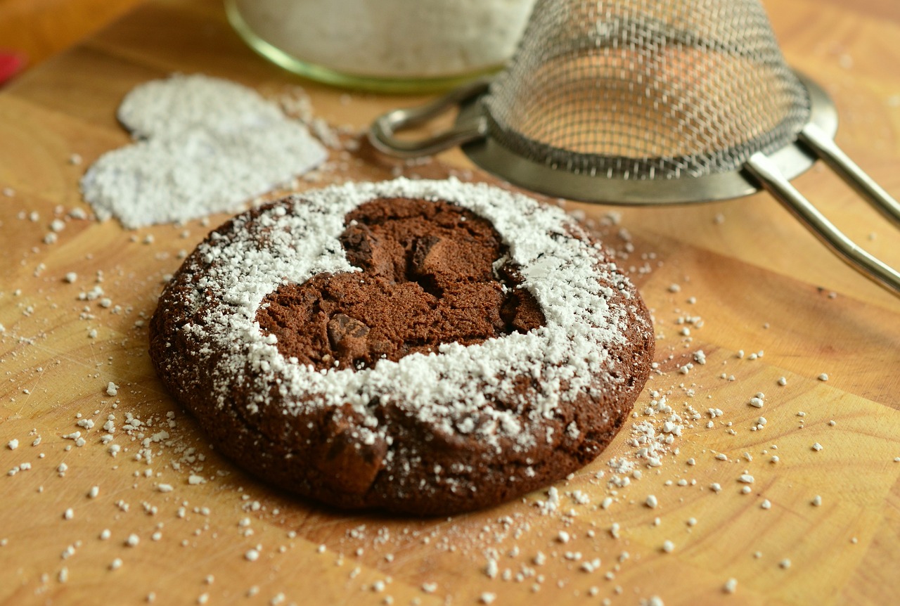 An image of a cookie with powdered sugar